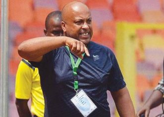 Minister’s Aide, Kola Daniel Endorses Aigbogun’s Return As Flying Eagles Coach