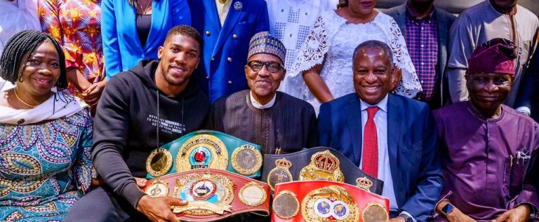 Anthony Joshua Presents Belts To President Buhari In London,  prostrates In Deference