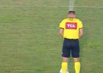 BIZZARE: Referee Caught Urinating On The Pitch Before Kick-off
