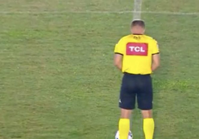 BIZZARE: Referee Caught Urinating On The Pitch Before Kick-off